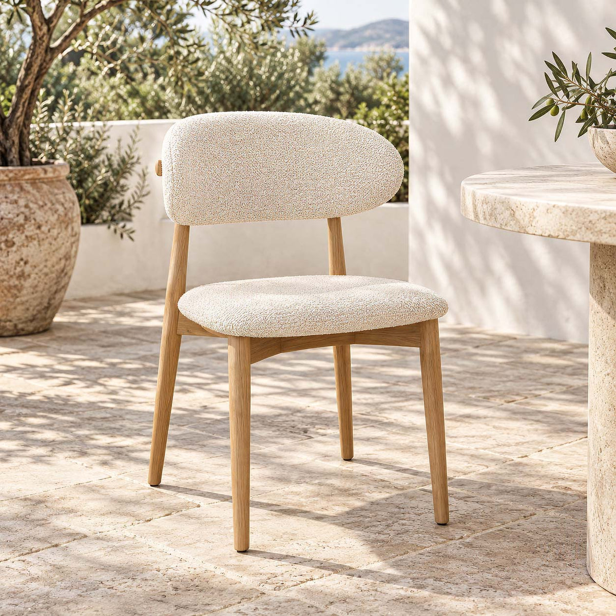 Gallery Everyday Aurora Chair in Jasmine White, featuring soft cream upholstery, a rounded padded backrest and a walnut-toned rubberwood frame.
