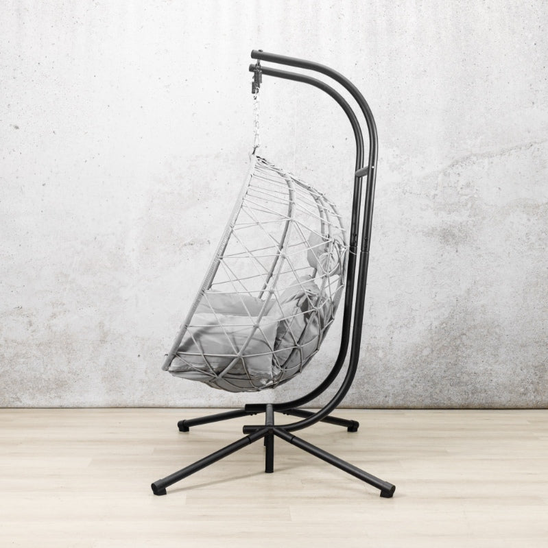 Spacious two-seater Emerson Hanging Egg Chair in grey, shown in a luxurious outdoor space. | Outdoor chairs, patio chairs for sale, hanging chair, egg chairs
