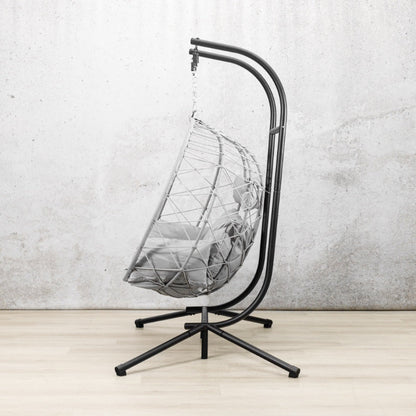 Spacious two-seater Emerson Hanging Egg Chair in grey, shown in a luxurious outdoor space. | Outdoor chairs, patio chairs for sale, hanging chair, egg chairs