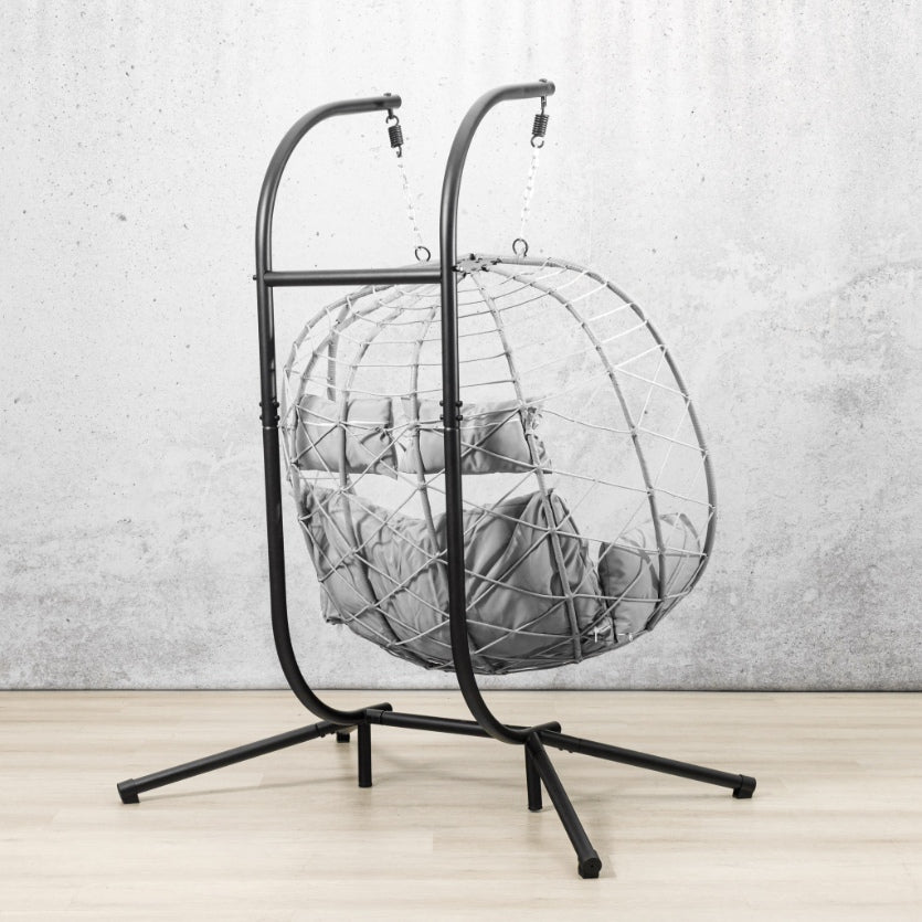 Spacious two-seater Emerson Hanging Egg Chair in grey, shown in a luxurious outdoor space. | Outdoor chairs, patio chairs for sale, hanging chair, egg chairs