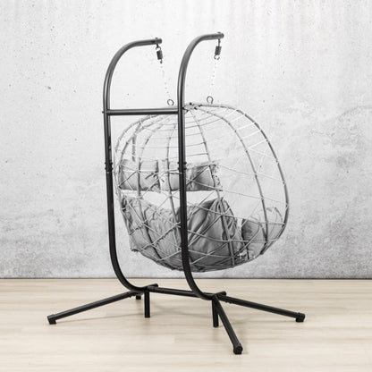 Spacious two-seater Emerson Hanging Egg Chair in grey, shown in a luxurious outdoor space. | Outdoor chairs, patio chairs for sale, hanging chair, egg chairs