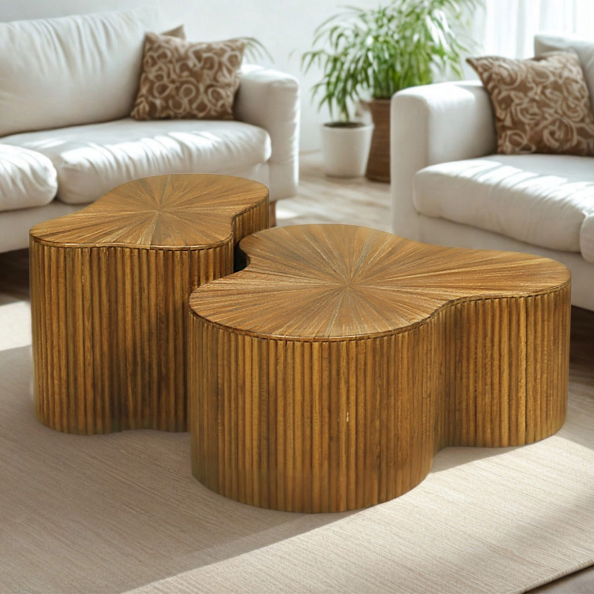 Two golden-brown wood coffee tables with a sunburst pattern on the top surface and vertical ridges along their sides. | Coffee tables, coffee tables for sale, nesting coffee tables