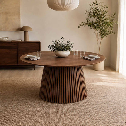 Camden round dining table in walnut, with tambour slat pedestal base styled in a warm, inviting living space. | dining table, round dining table, 4 seater dining table, wood dining table