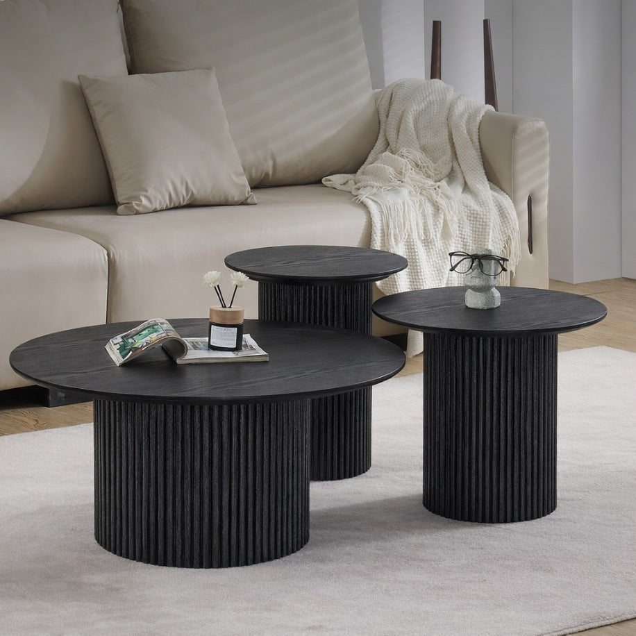 Helmsley Coffee Tables - Black, Set of 3, shown styled in a minimalist lounge setting. | coffee tables, coffee tables for sale, wood coffee table, round coffee tables 