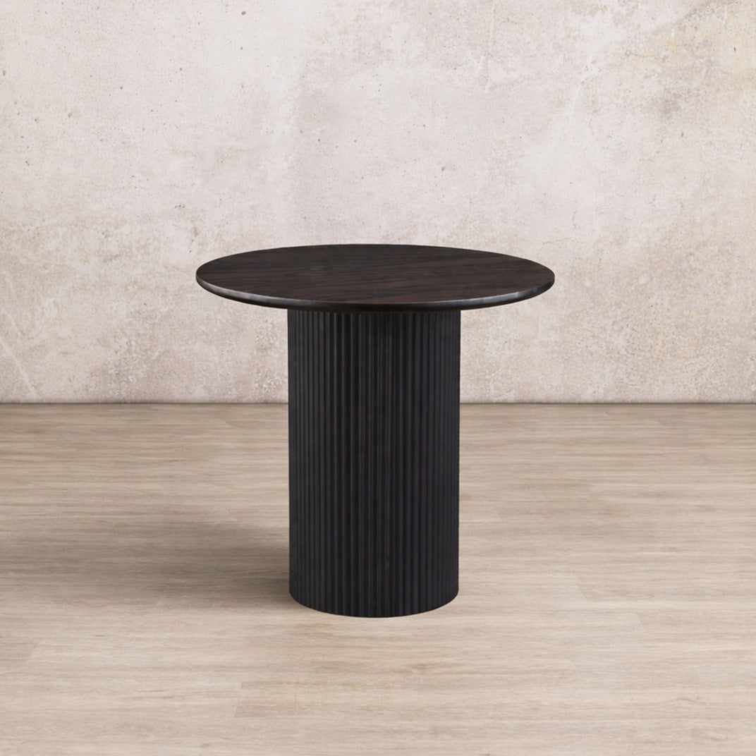 Helmsley Coffee Table, in a black colour, perfect for minimalist spaces.| Coffee tables, round coffee tables, wood coffee table, black coffee table