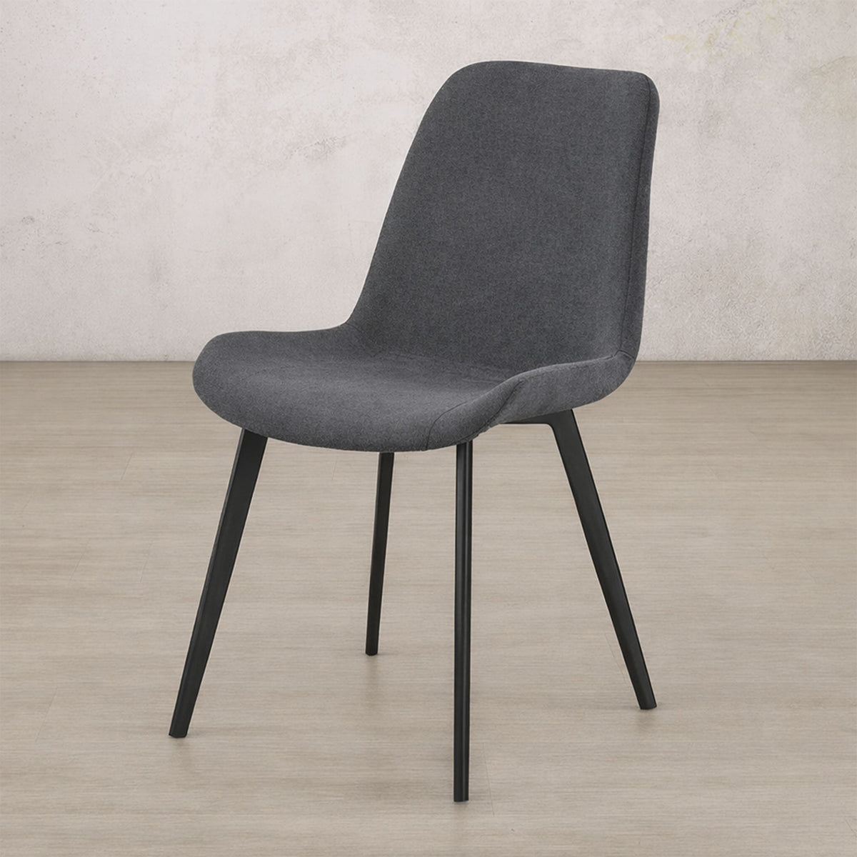 Angle view of the Nora fabric dining chair in Storm Grey | dining chairs, dining chairs for sale, fabric dining chair, dining chairs for round table