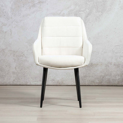 Octavia fabric dining chair in ivory linen with black tapered legs, front view. | Leather Gallery Dining Chairs, modern dining chairs, fabric dining chairs 