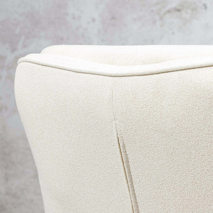 Close-up of Octavia dining chair's channel-stitched ivory linen backrest. |dining chairs, white dining chairs
