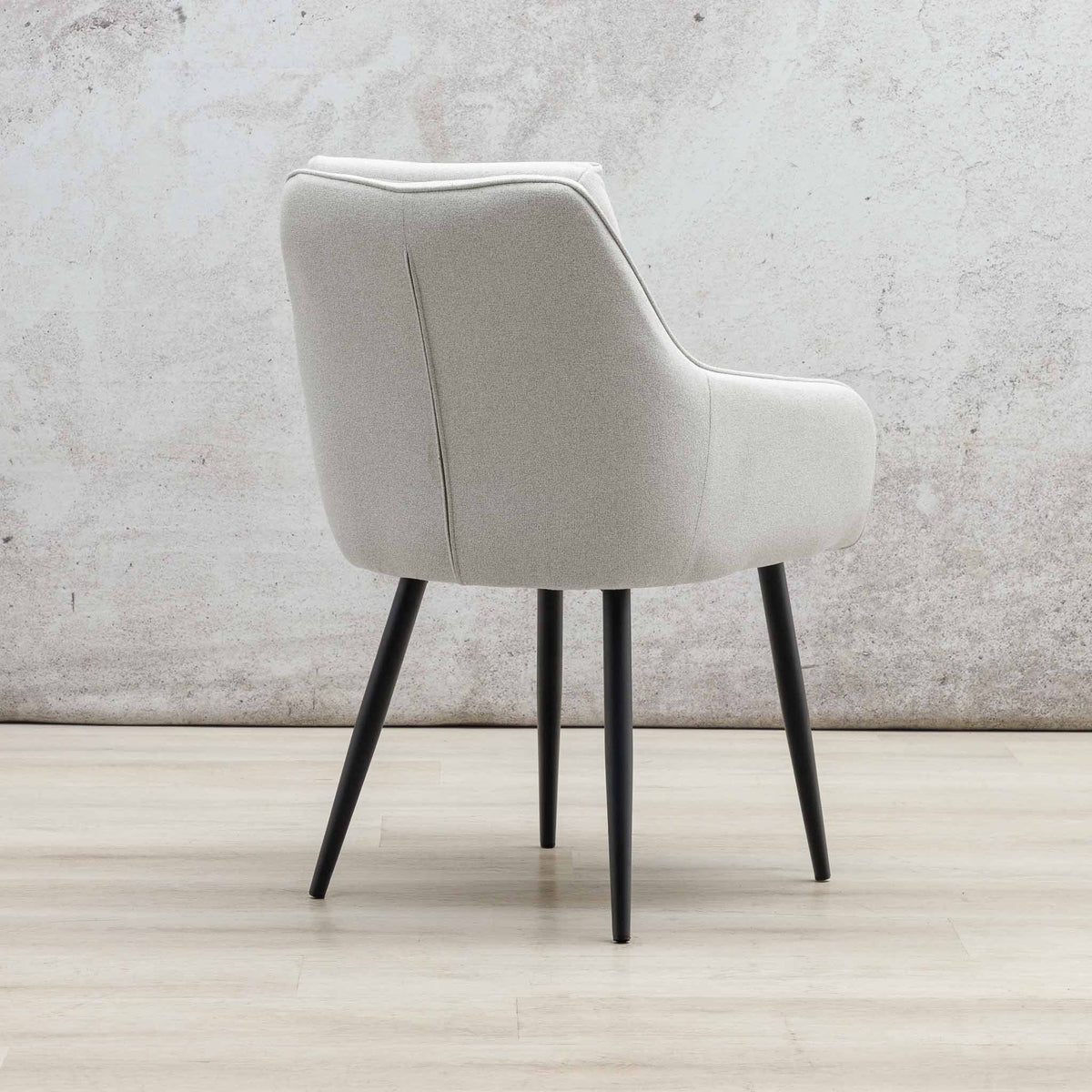 Back view of Octavia light grey dining chair showing linen upholstery and tapered legs. | dining chairs, fabric dining chair