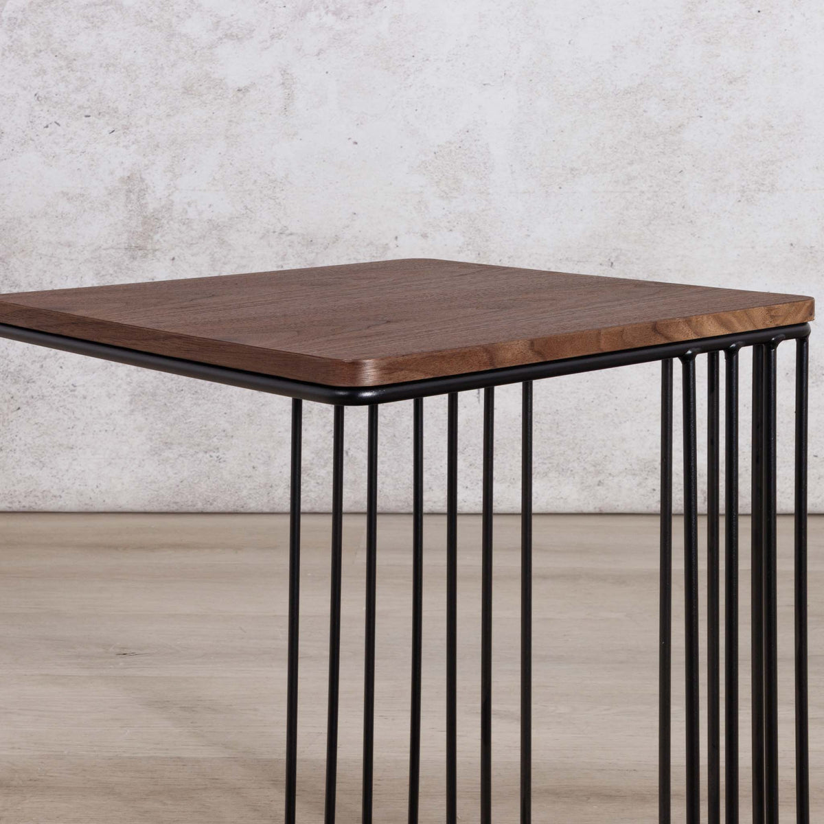 Gallery Everyday Camila Side Table in Walnut, featuring a dark wood square top and black metal wire-frame base.